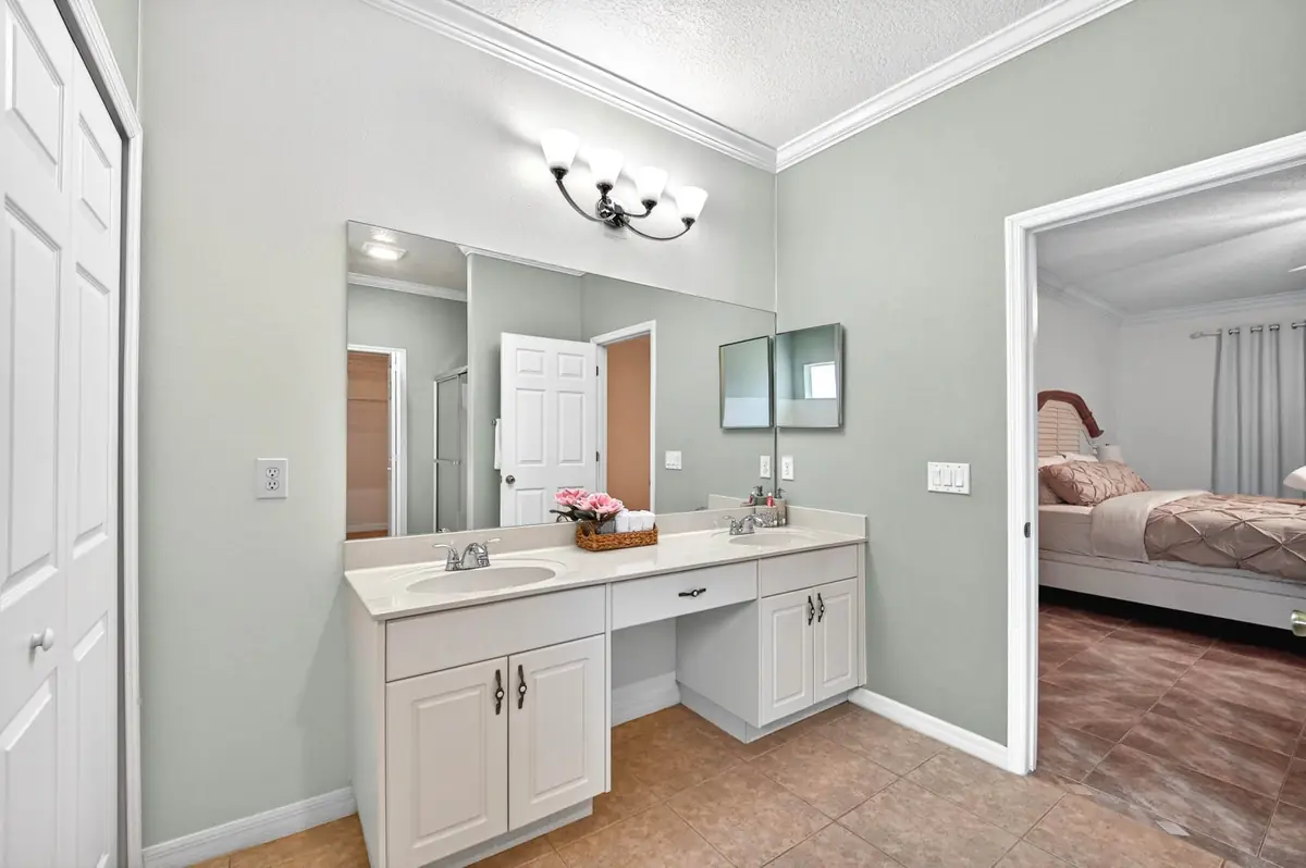 Bathroom vanity with a large mirror